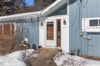 This charming 1.5-story home offers water access to Lake Iola on Glacier Wood Golf Club in Wisconsin - for sale on GolfHomes.com, golf home, golf lot