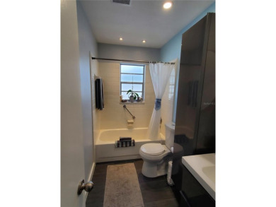 WELCOME TO THIS WARM AND INVITING, NO HOA FEE, SOLAR HOME, where on Sandpiper Golf Club in Florida - for sale on GolfHomes.com, golf home, golf lot