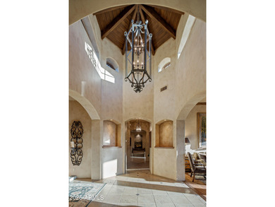 Welcome to a custom-built residence that epitomizes classic on Troon Country Club in Arizona - for sale on GolfHomes.com, golf home, golf lot