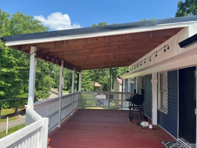 MOVE-IN READY, FURNISHED PROPERTY FOR LESS THAN $100K.  This on River Ridge Golf Club in Virginia - for sale on GolfHomes.com, golf home, golf lot