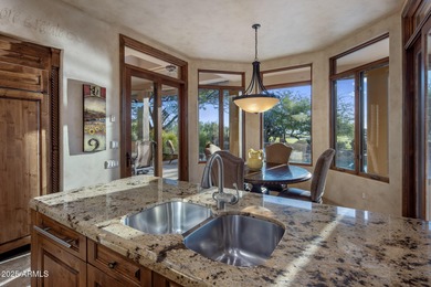 Welcome to a custom-built residence that epitomizes classic on Troon Country Club in Arizona - for sale on GolfHomes.com, golf home, golf lot