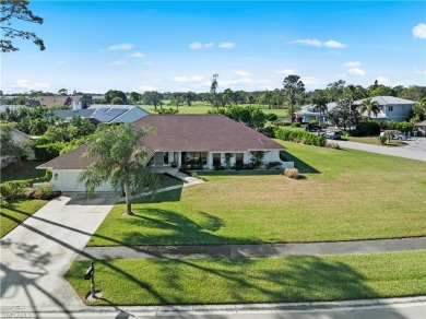 This exquisite single-family home is situated in the highly on Imperial Golf Club in Florida - for sale on GolfHomes.com, golf home, golf lot