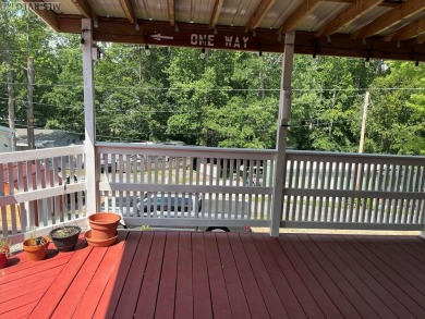MOVE-IN READY, FURNISHED PROPERTY FOR LESS THAN $100K.  This on River Ridge Golf Club in Virginia - for sale on GolfHomes.com, golf home, golf lot