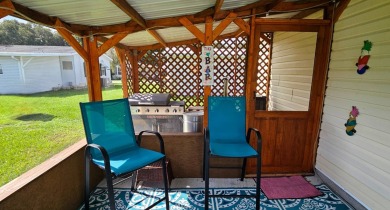 Florida fun and entertaining home with space for all your events on Zephyrhills Municipal Golf Course in Florida - for sale on GolfHomes.com, golf home, golf lot
