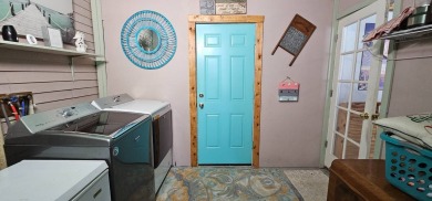 Florida fun and entertaining home with space for all your events on Zephyrhills Municipal Golf Course in Florida - for sale on GolfHomes.com, golf home, golf lot