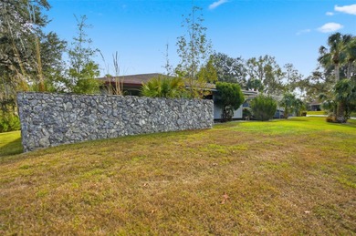 One or more photo(s) has been virtually staged. Beautiful Custom on Brooksville Country Club At Majestic Oaks in Florida - for sale on GolfHomes.com, golf home, golf lot