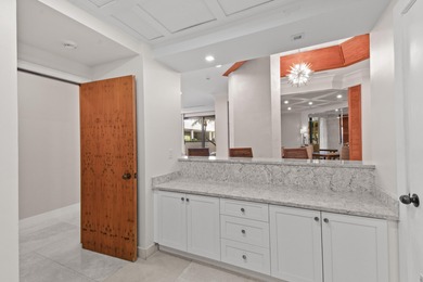 Step into this exquisitely reimagined condo in the prestigious on Jonathans Landing Golf Club in Florida - for sale on GolfHomes.com, golf home, golf lot