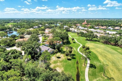 LOOKING FOR A CUSTOM HOME WITH A THREE FULL THREE CAR GARAGE IN on The Venice Golf and Country Club in Florida - for sale on GolfHomes.com, golf home, golf lot