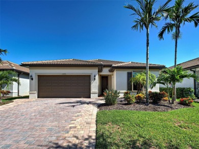 This gorgeous SUMMERWOOD model in ISLANDWALK offers an on Sarasota National Golf Club in Florida - for sale on GolfHomes.com, golf home, golf lot