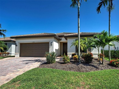 This gorgeous SUMMERWOOD model in ISLANDWALK offers an on Sarasota National Golf Club in Florida - for sale on GolfHomes.com, golf home, golf lot