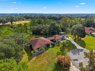 One or more photo(s) has been virtually staged. Beautiful Custom on Brooksville Country Club At Majestic Oaks in Florida - for sale on GolfHomes.com, golf home, golf lot