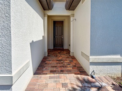 This gorgeous SUMMERWOOD model in ISLANDWALK offers an on Sarasota National Golf Club in Florida - for sale on GolfHomes.com, golf home, golf lot
