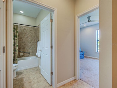 This gorgeous SUMMERWOOD model in ISLANDWALK offers an on Sarasota National Golf Club in Florida - for sale on GolfHomes.com, golf home, golf lot