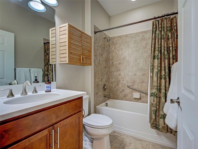 This gorgeous SUMMERWOOD model in ISLANDWALK offers an on Sarasota National Golf Club in Florida - for sale on GolfHomes.com, golf home, golf lot