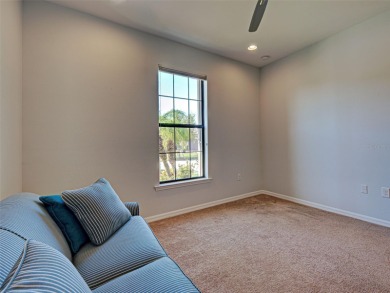 This gorgeous SUMMERWOOD model in ISLANDWALK offers an on Sarasota National Golf Club in Florida - for sale on GolfHomes.com, golf home, golf lot