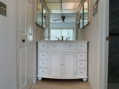 Discover exceptional value & endless potential in this first on Sunrise Lakes Phase III in Florida - for sale on GolfHomes.com, golf home, golf lot