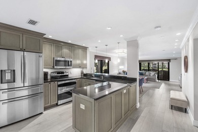 COMPLETELY RENOVATED 1ST-FLOOR CORNER 2br/2bth condo in a lush on Delray Dunes Golf and Country Club in Florida - for sale on GolfHomes.com, golf home, golf lot