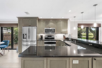 COMPLETELY RENOVATED 1ST-FLOOR CORNER 2br/2bth condo in a lush on Delray Dunes Golf and Country Club in Florida - for sale on GolfHomes.com, golf home, golf lot