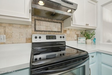 Discover this modernized 2-bedroom, 2.5 bath townhome in Ponte on Marsh Landing Country Club - Saint Johns County in Florida - for sale on GolfHomes.com, golf home, golf lot