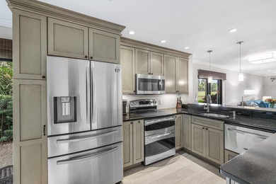 COMPLETELY RENOVATED 1ST-FLOOR CORNER 2br/2bth condo in a lush on Delray Dunes Golf and Country Club in Florida - for sale on GolfHomes.com, golf home, golf lot