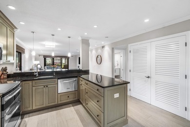 COMPLETELY RENOVATED 1ST-FLOOR CORNER 2br/2bth condo in a lush on Delray Dunes Golf and Country Club in Florida - for sale on GolfHomes.com, golf home, golf lot