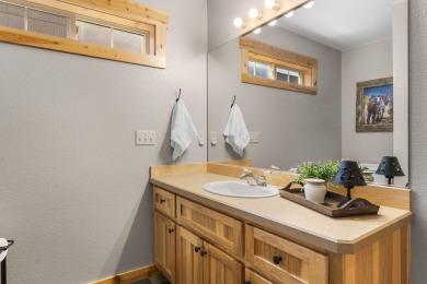 Discover rustic elegance in this charming chalet nestled within on Eagle Crest Golf Resort - Resort Course in Oregon - for sale on GolfHomes.com, golf home, golf lot