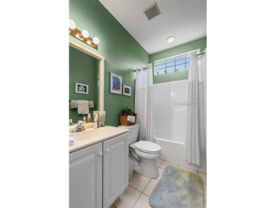 Charming Dogwood Model on the 5th Tee of Hidden Cypress. Nestled on Hidden Cypress Golf Club in South Carolina - for sale on GolfHomes.com, golf home, golf lot