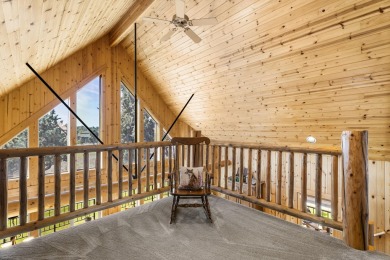 Discover rustic elegance in this charming chalet nestled within on Eagle Crest Golf Resort - Resort Course in Oregon - for sale on GolfHomes.com, golf home, golf lot