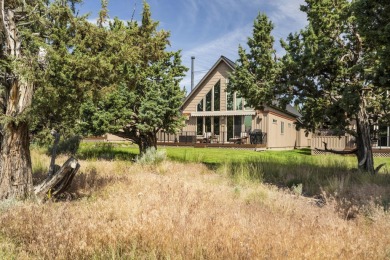 Discover rustic elegance in this charming chalet nestled within on Eagle Crest Golf Resort - Resort Course in Oregon - for sale on GolfHomes.com, golf home, golf lot