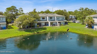 Discover this modernized 2-bedroom, 2.5 bath townhome in Ponte on Marsh Landing Country Club - Saint Johns County in Florida - for sale on GolfHomes.com, golf home, golf lot