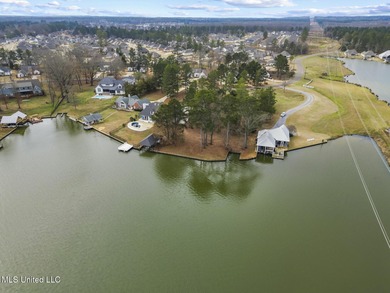 Waterfront Living at Its Finest in Lake Caroline - Madison, MS on Lake Caroline Golf Club in Mississippi - for sale on GolfHomes.com, golf home, golf lot