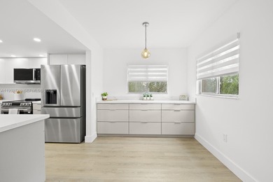 Beautifully renovated 2 bedroom, 2 bath residence overlooking on Flamingo Lakes Country Club in Florida - for sale on GolfHomes.com, golf home, golf lot