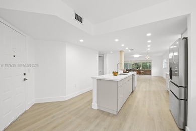 Beautifully renovated 2 bedroom, 2 bath residence overlooking on Flamingo Lakes Country Club in Florida - for sale on GolfHomes.com, golf home, golf lot