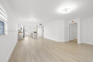 Beautifully renovated 2 bedroom, 2 bath residence overlooking on Flamingo Lakes Country Club in Florida - for sale on GolfHomes.com, golf home, golf lot