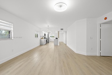 Beautifully renovated 2 bedroom, 2 bath residence overlooking on Flamingo Lakes Country Club in Florida - for sale on GolfHomes.com, golf home, golf lot