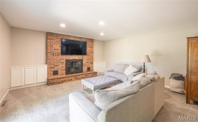 This stunning 2-story home offers 4 bedrooms, 2 full baths, and on Oak Meadow Country Club in Missouri - for sale on GolfHomes.com, golf home, golf lot
