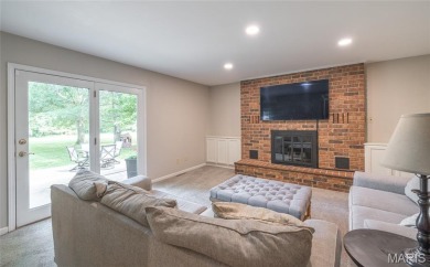 This stunning 2-story home offers 4 bedrooms, 2 full baths, and on Oak Meadow Country Club in Missouri - for sale on GolfHomes.com, golf home, golf lot