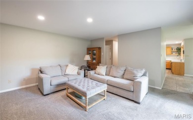 This stunning 2-story home offers 4 bedrooms, 2 full baths, and on Oak Meadow Country Club in Missouri - for sale on GolfHomes.com, golf home, golf lot