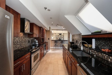 Penthouse living at its finest! This rare two-story home on the on Sky Meadow Country Club in New Hampshire - for sale on GolfHomes.com, golf home, golf lot