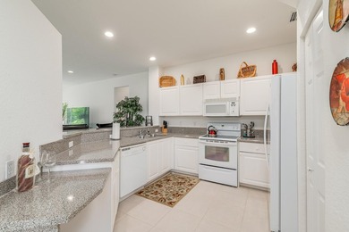 Villa for sale, first floor furnished villa with 2 bedrooms, den on Santa Lucia River Club in Florida - for sale on GolfHomes.com, golf home, golf lot