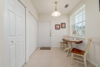 Villa for sale, first floor furnished villa with 2 bedrooms, den on Santa Lucia River Club in Florida - for sale on GolfHomes.com, golf home, golf lot