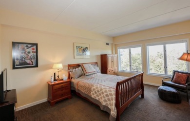 Penthouse living at its finest! This rare two-story home on the on Sky Meadow Country Club in New Hampshire - for sale on GolfHomes.com, golf home, golf lot