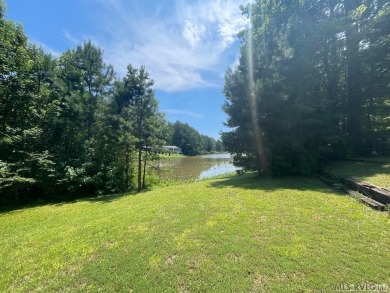Scenic Double Lot with Pond  Pool Views - River Ridge, Bracey VA on River Ridge Golf Club in Virginia - for sale on GolfHomes.com, golf home, golf lot