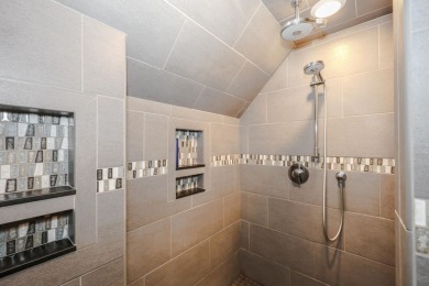 Penthouse living at its finest! This rare two-story home on the on Sky Meadow Country Club in New Hampshire - for sale on GolfHomes.com, golf home, golf lot
