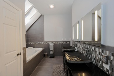 Penthouse living at its finest! This rare two-story home on the on Sky Meadow Country Club in New Hampshire - for sale on GolfHomes.com, golf home, golf lot