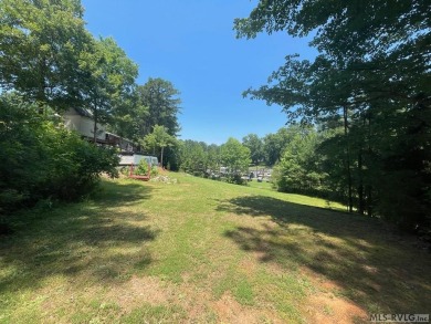 Scenic Double Lot with Pond  Pool Views - River Ridge, Bracey VA on River Ridge Golf Club in Virginia - for sale on GolfHomes.com, golf home, golf lot
