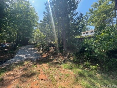Scenic Double Lot with Pond  Pool Views - River Ridge, Bracey VA on River Ridge Golf Club in Virginia - for sale on GolfHomes.com, golf home, golf lot