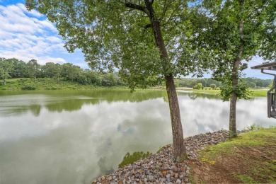 Vista View across a large pond with a fairway beyond. One of on Diamondhead Golf and Country Club in Arkansas - for sale on GolfHomes.com, golf home, golf lot