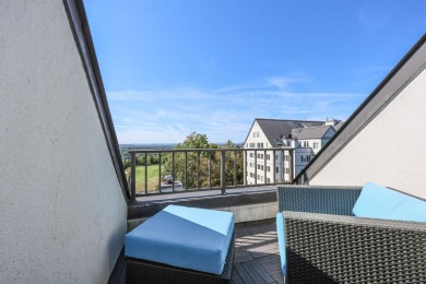 Penthouse living at its finest! This rare two-story home on the on Sky Meadow Country Club in New Hampshire - for sale on GolfHomes.com, golf home, golf lot
