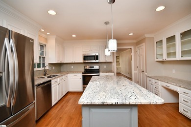 Discover this beautifully crafted all-brick 5-bedroom, 3-bath on Holly Tree Country Club in South Carolina - for sale on GolfHomes.com, golf home, golf lot